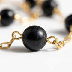 Bransoletka z obsydianem czarnym i miedzią w kolorze złotym - zdjęcie 3
