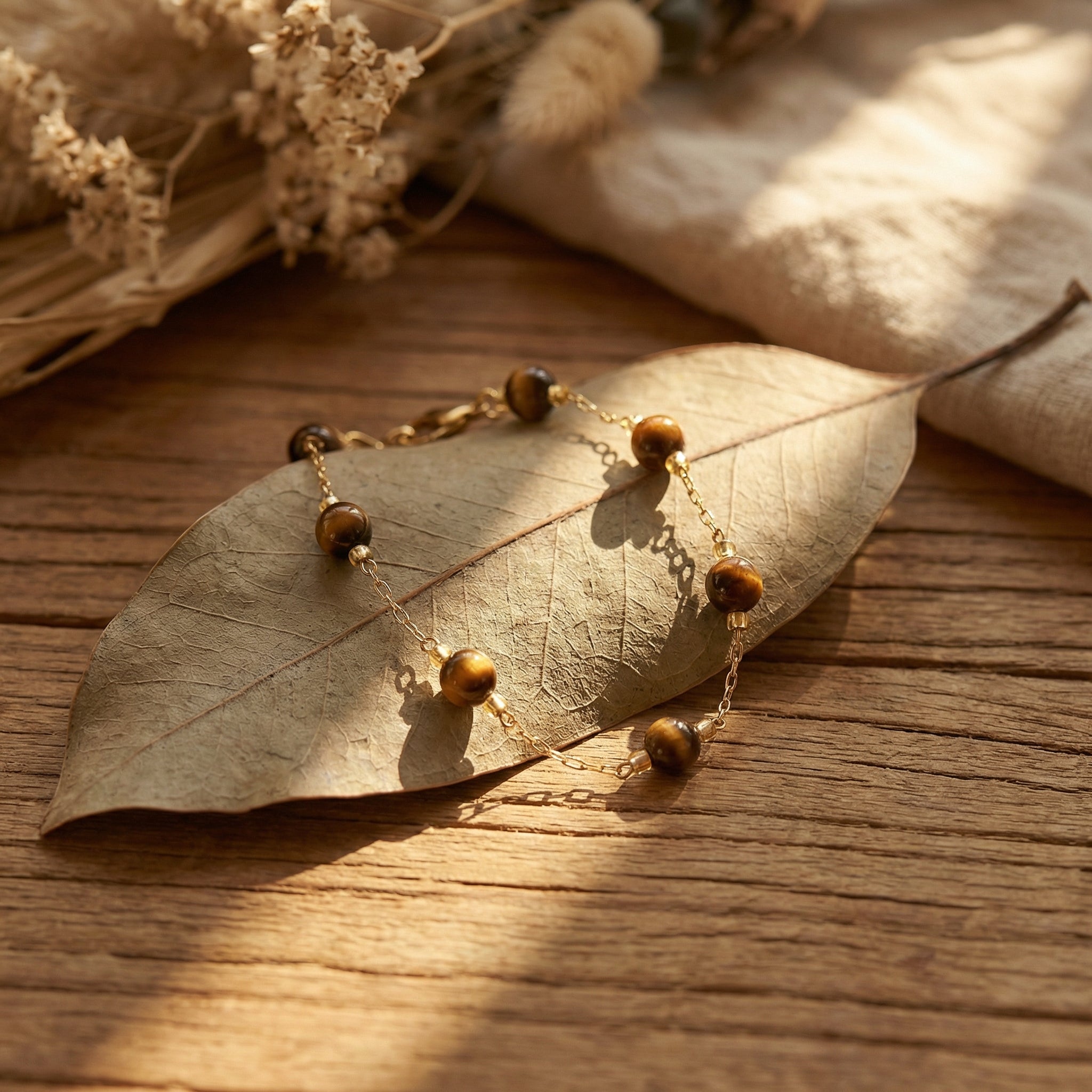 Bransoletka z tygrysim okiem i miedzianymi elementami - zdjęcie 4