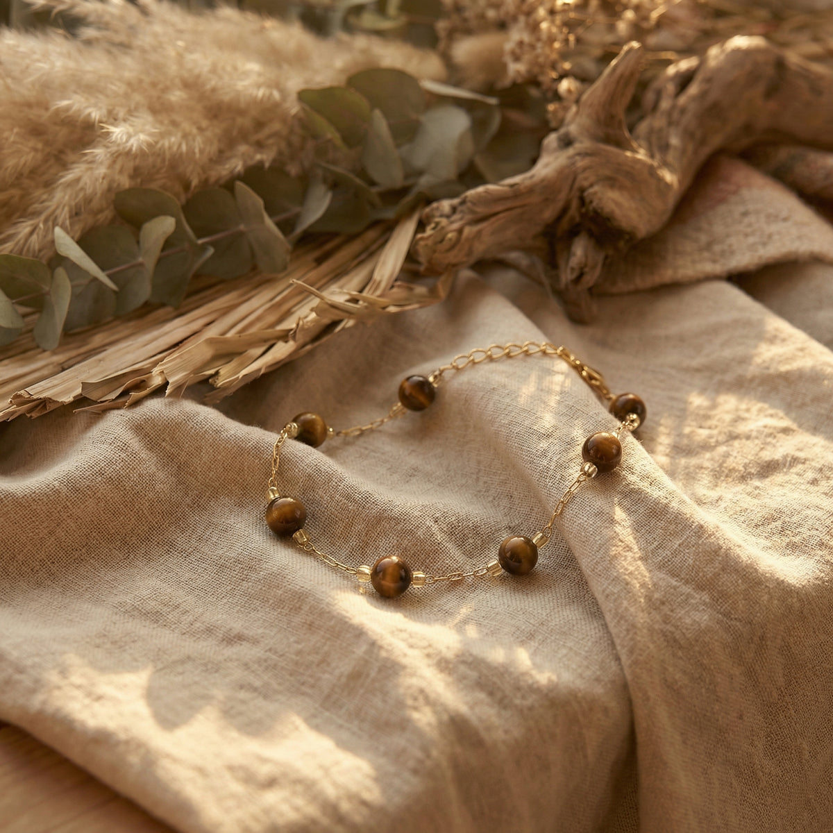 Bransoletka z tygrysim okiem i miedzianymi elementami - zdjęcie 1