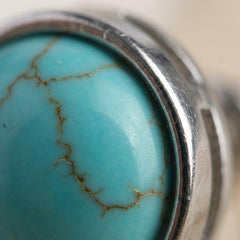 Zawieszka z turkusem syntetycznym i stalą w kolorze srebrnym - zdjęcie 3