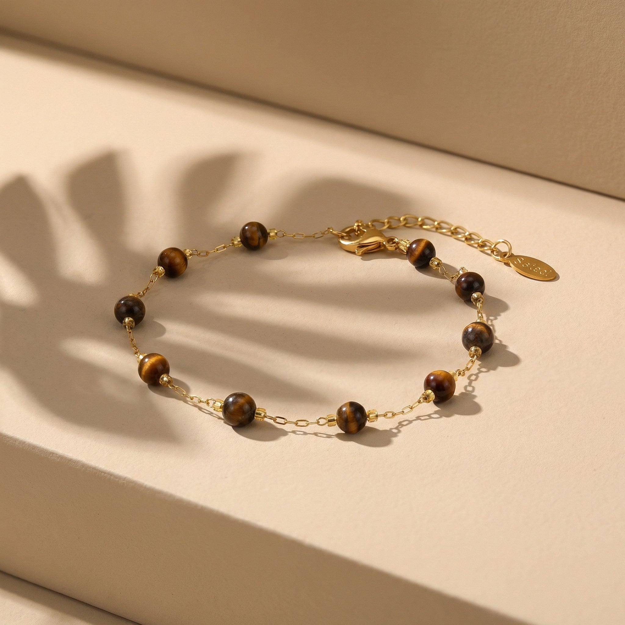 Bransoletka z tygrysim okiem i miedzianymi elementami - zdjęcie 5