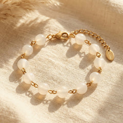 Bransoletka z kryształem górskim i miedzią w złotym kolorze - zdjęcie 1